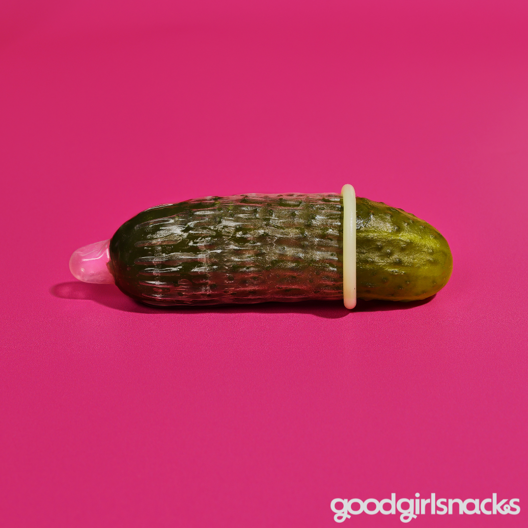 A Good Girl Snacks Hot Girl Pickle inside of a condom.